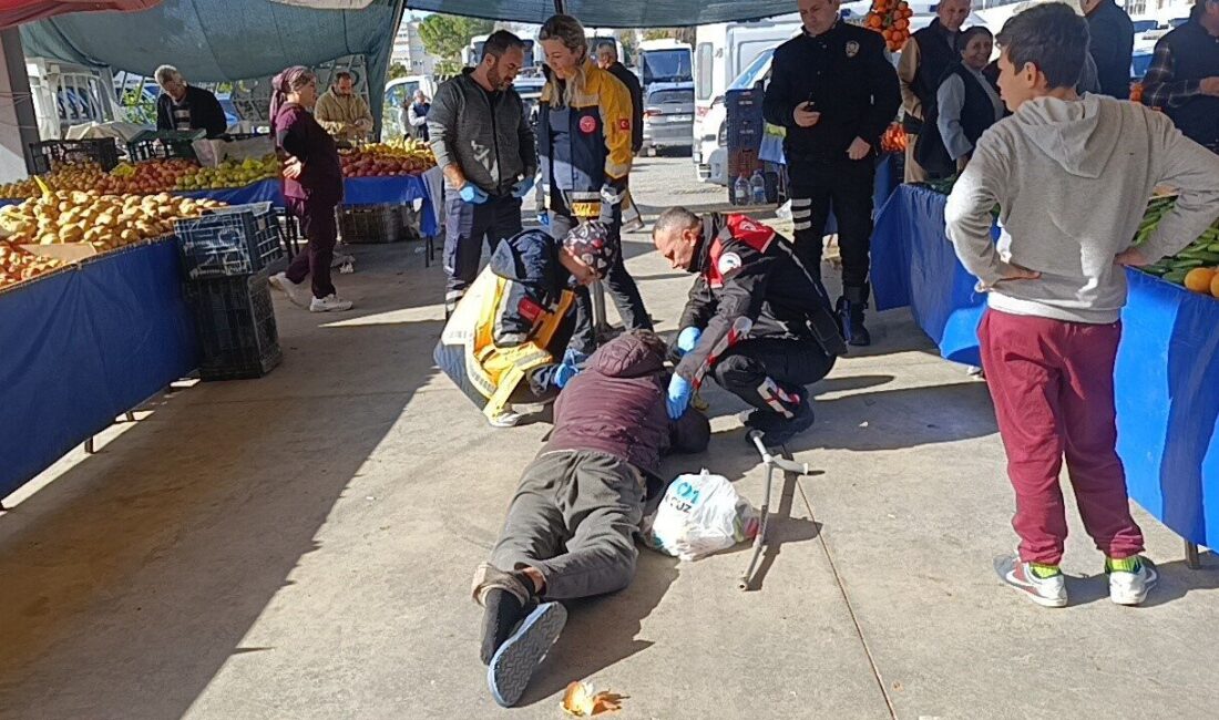 Antalya’nın Manavgat ilçesinde, semt pazarında uzun süre yerde hareketsiz yatan