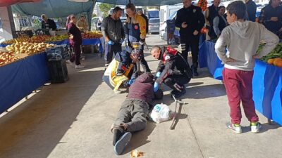 Antalya’nın Manavgat ilçesinde, semt pazarında uzun süre yerde hareketsiz yatan