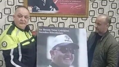 Mersin’in Tarsus ilçesinde yıllardır özveriyle çalışan trafik polisi esnafın sürpriz