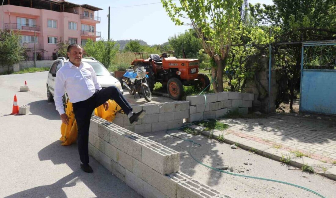 Denizli’de belediyenin asfalt döküp kaldırım yaptığı yolu “tapulu arazim” diyerek