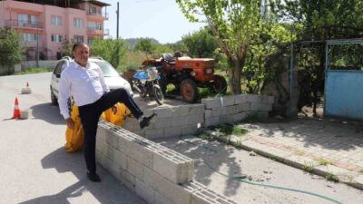 Denizli’de belediyenin asfalt döküp kaldırım yaptığı yolu “tapulu arazim” diyerek