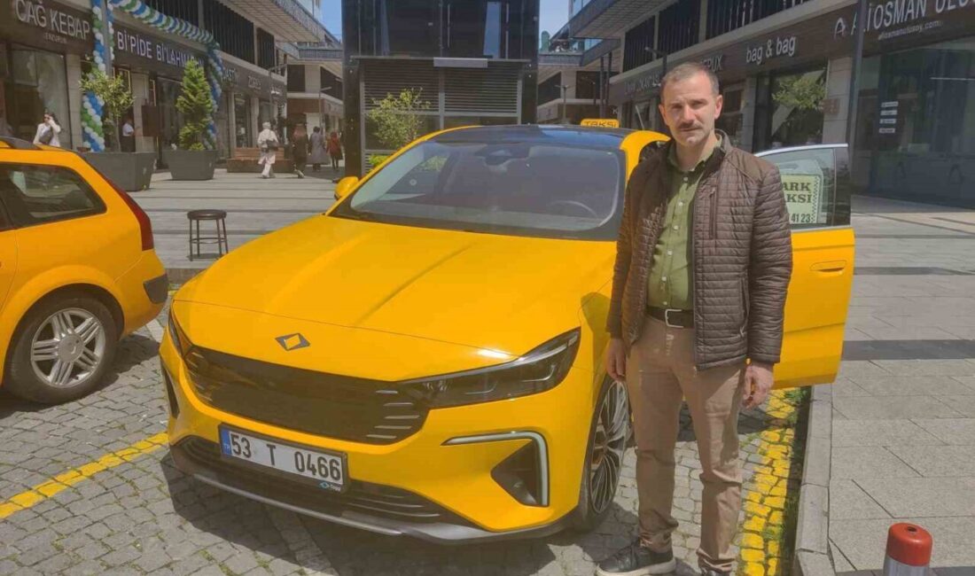 Rize şehir merkezinde taksicilik yapan Şenol Yazıcı, yerli ve elektrikli